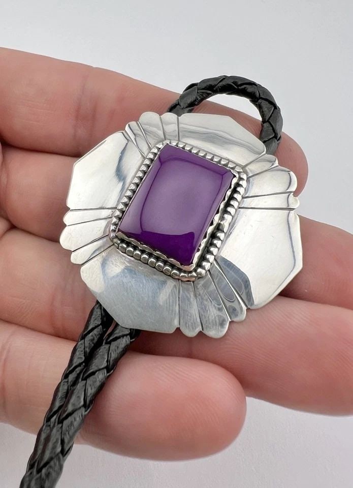 VTG NAVAJO STERLING SILVER SUGILITE? CHAROITE? STAMPED RECTANGLE BOLO TIE 1 5/8": VTG NAVAJO STERLING SILVER SUGILITE? CHAROITE? STAMPED RECTANGLE BOLO TIE 1 5/8" Vtg Navajo Sterling Silver Sugilite? Charoite? Stamped Rectangle Bolo Tie 1 5/8" Size: 1 5/8" Tall & Wide Weight is 21.