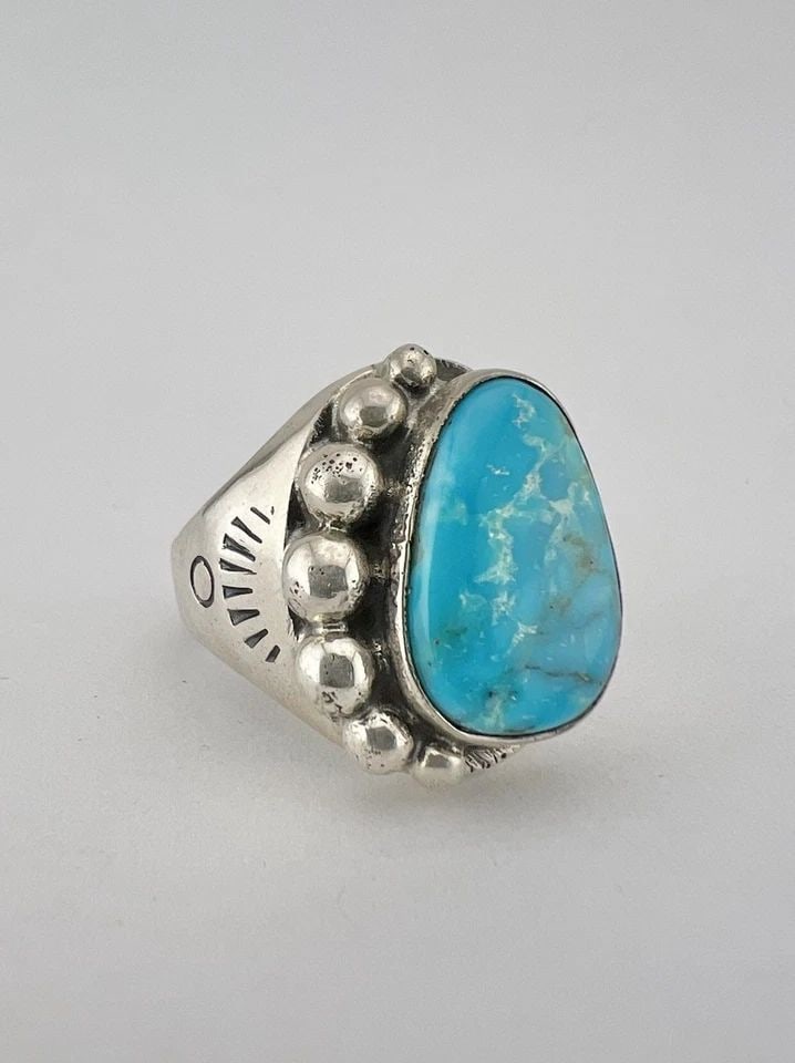VTG NAVAJO STERLING SILVER BLUE FOX TURQUOISE STAMPED BALL MEN'S RING 12.8G: VTG NAVAJO STERLING SILVER BLUE FOX TURQUOISE STAMPED BALL MEN'S RING 12.8G Vtg Navajo Sterling Silver Blue Fox Turquoise Stamped Ball Men's Ring 12.8g Ring Size: 9- Can Be Re Sized Weight is 12.8 Gra