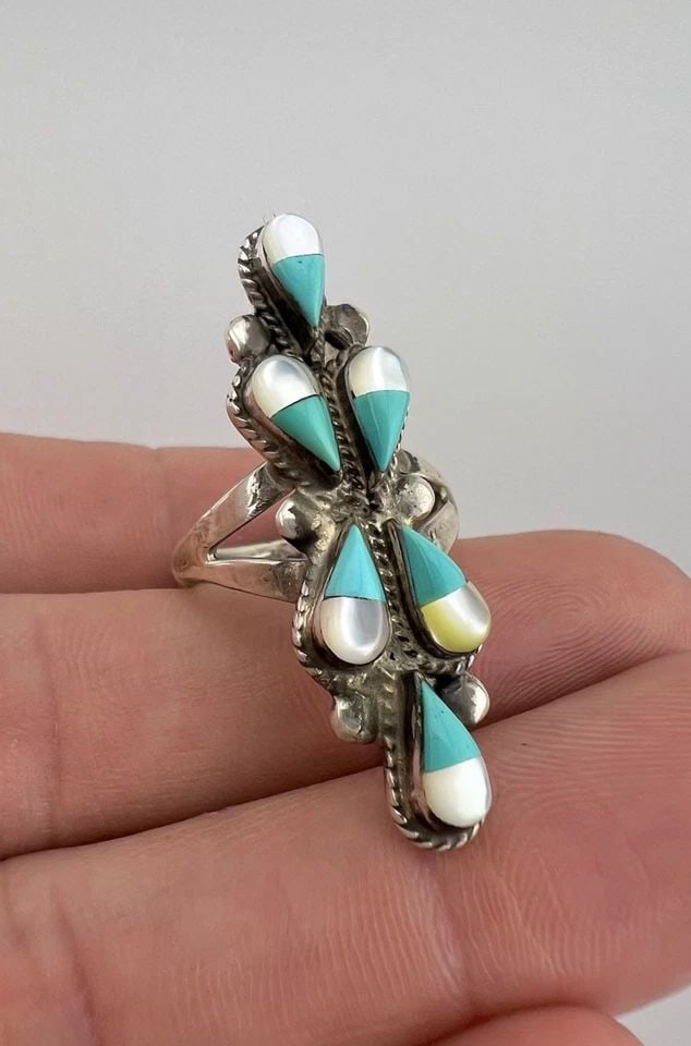 VTG ZUNI STERLING SILVER TURQUOISE & MOTHER OF PEARL CLUSTER LONG RING 1.5": VTG ZUNI STERLING SILVER TURQUOISE & MOTHER OF PEARL CLUSTER LONG RING 1.5" Vtg Zuni Sterling Silver Turquoise & Mother Of Pearl Cluster Long Ring 1.5" Size: 7.25 - Can Be re Sized Weight is 6.3 Grams