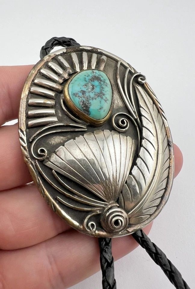 VTG NAVAJO NICKEL SILVER NATURAL MORENCI TURQUOISE STAMPED OVAL BOLO TIE 2.75": VTG NAVAJO NICKEL SILVER NATURAL MORENCI TURQUOISE STAMPED OVAL BOLO TIE 2.75" Vtg Navajo Nickel Silver Natural Morenci Turquoise Stamped Oval Bolo Tie 2.75" Size: Around 2 3/4" Tall by 2 1/8" Wide We
