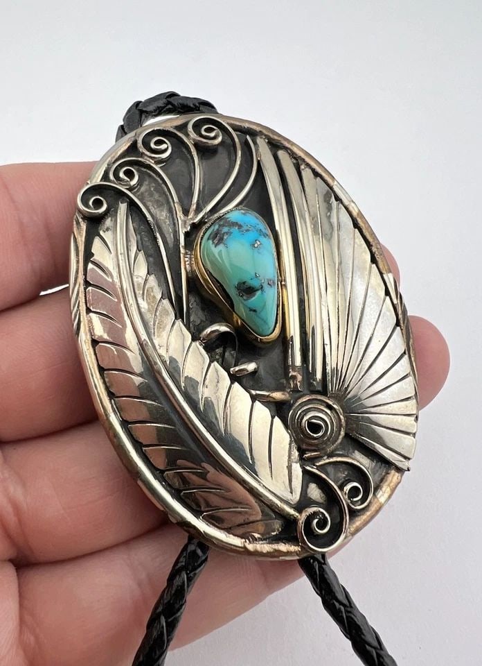 VTG NAVAJO NICKEL SILVER NATURAL MORENCI TURQUOISE STAMPED OVAL BOLO TIE 2.75": VTG NAVAJO NICKEL SILVER NATURAL MORENCI TURQUOISE STAMPED OVAL BOLO TIE 2.75" Vtg Navajo Nickel Silver Natural Morenci Turquoise Stamped Oval Bolo Tie 2.75" Size: 2 3/4" Tall by 2" Wide Weight is 52.