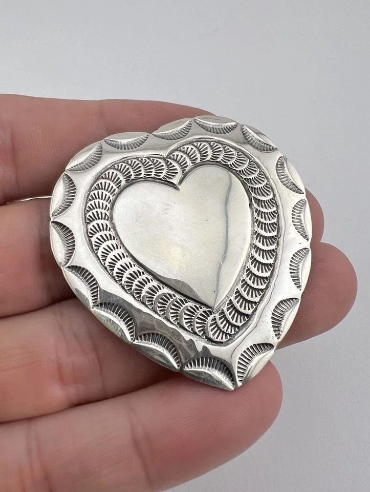 VINTAGE RJ NAVAJO STERLING SILVER DEEP STAMPED HEART CONCHO PIN BROOCH 1 7/8": VINTAGE RJ NAVAJO STERLING SILVER DEEP STAMPED HEART CONCHO PIN BROOCH 1 7/8" Vintage RJ Navajo Sterling Silver Deep Stamped Heart Concho Pin Brooch 1 7/8" Size: 1 7/8" Tall & Almost 1 7/8" Wide Metal