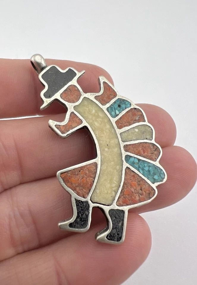 VTG ZUNI STERLING SILVER CHIP INLAY TURQUOISE & CORAL RAINBOWMAN KACHINA PENDANT: VTG ZUNI STERLING SILVER CHIP INLAY TURQUOISE & CORAL RAINBOWMAN KACHINA PENDANT Vtg Zuni Sterling Silver Chip Inlay Turquoise & Coral Rainbowman Kachina Pendant Size: 2 1/8" Tall With bail By 1 1/4" 