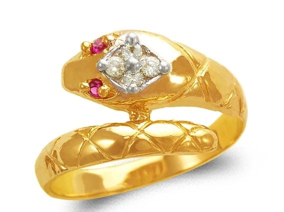 NEW 14K TWO TONE GOLD LADIES SNAKE FASHION RING: NEW 14K TWO TONE GOLD LADIES SNAKE FASHION RING LADIES SNAKE FASHION RING NEW 14K TWO TONE GOLD Apx. WIDTH: 12mm Apx. WEIGHT: 3.1g