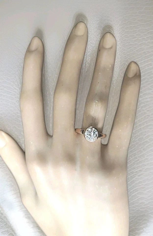 VINTAGE 14K ROSE GOLD ENGAGEMENT BEZEL RING 1.74CT. ROUND SHAPE NATURAL DIAMOND: VINTAGE 14K ROSE GOLD ENGAGEMENT BEZEL RING 1.74CT. ROUND SHAPE NATURAL DIAMOND Make an unforgettable statement with this stunning vintage engagement ring, exquisitely crafted in 14K rose gold. At its