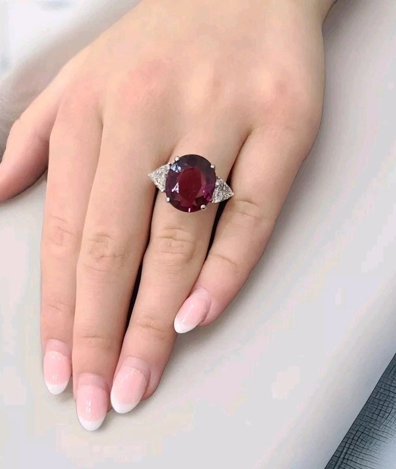 VINTAGE 14K WHITE GOLD ENGAGEMENT RING 7.16CT. NATURAL PINK TOURMALINE OVAL GIA: VINTAGE 14K WHITE GOLD ENGAGEMENT RING 7.16CT. NATURAL PINK TOURMALINE OVAL GIA This vintage engagement ring is a stunning piece of jewelry that is perfect for any special occasion. Crafted from 14k w