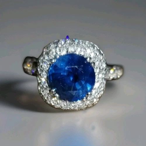 18K WHITE GOLD ENGAGEMENT RING 3.27CT. NATURAL BLUE SAPPHIRE ROUND SHAPE: 18K WHITE GOLD ENGAGEMENT RING 3.27CT. NATURAL BLUE SAPPHIRE ROUND SHAPE GORGEOUS 18K WHITE & YELLOW GOLD natural blue Sapphire round shape center weight 2.01ct. size 8.1mm very nice rich royal blue c