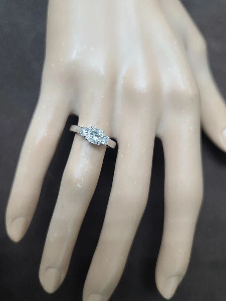 VINTAGE 14K WHITE GOLD ENGAGEMENT RING 1.08CT.NATURAL RADIANT DIAMOND SI1-J: VINTAGE 14K WHITE GOLD ENGAGEMENT RING 1.08CT.NATURAL RADIANT DIAMOND SI1-J Vintage 14k white gold engagement three-stone ring. Center natural Radiant cut diamond WEIGHT 0.82ct. SIZE 5.5x5.3mm SI1-J C