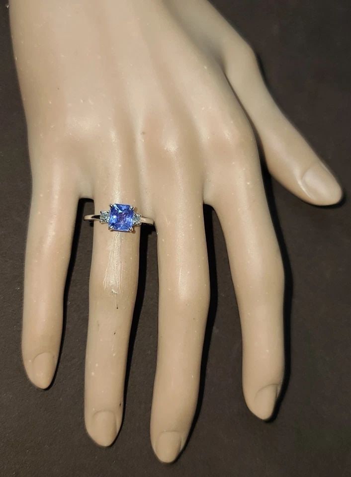 VINTAGE 14K WHITE GOLD ENGAGEMENT RING 2.05CT.NATURAL BLUE VIOLET SAPPHIRE: VINTAGE 14K WHITE GOLD ENGAGEMENT RING 2.05CT.NATURAL BLUE VIOLET SAPPHIRE This gorgeous vintage 14K White Gold Engagement ring features a beautiful 2.05ct natural blue-violet sapphire as the main sto