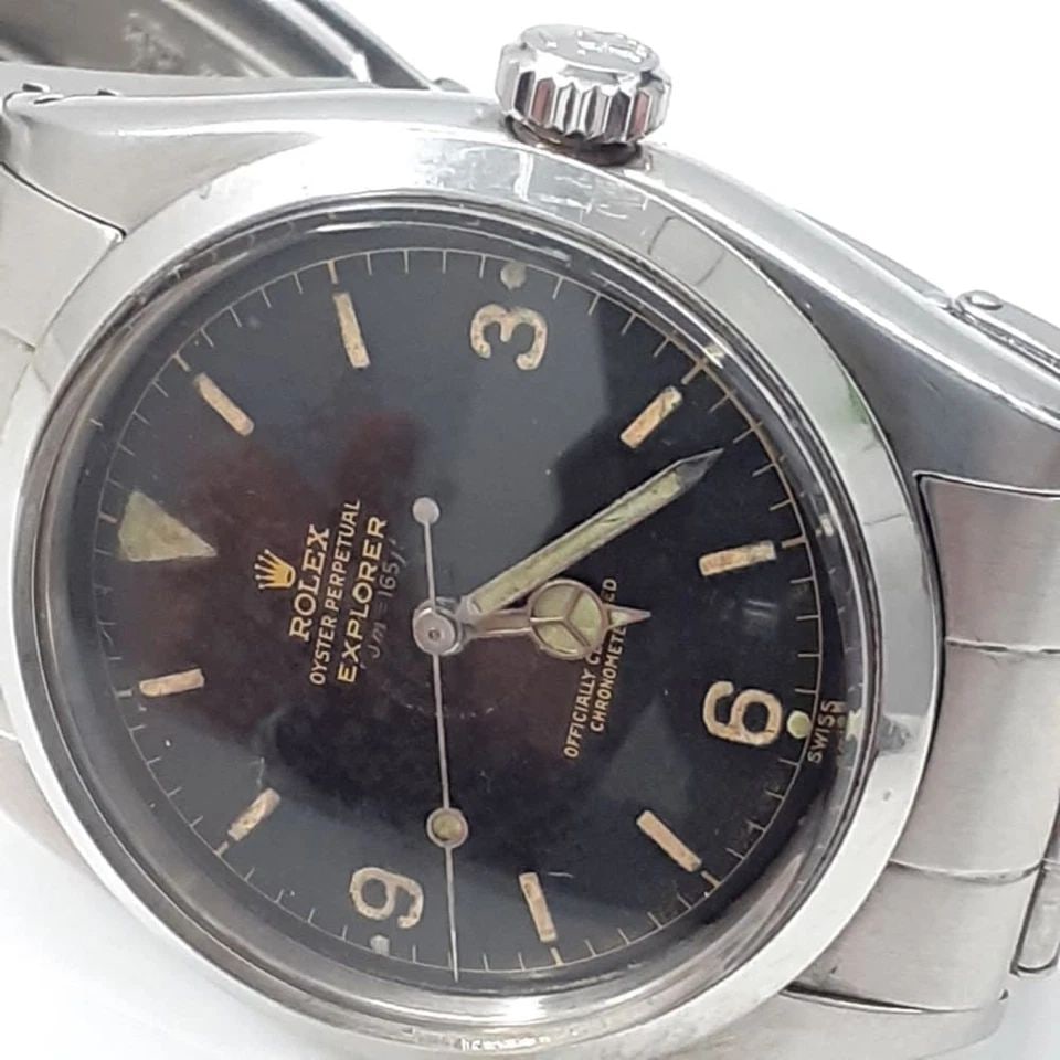 VINTAGE RARE ROLEX EXPLORER 36 MM STEEL AUTOMATIC BLACK GILT DIAL WATCH 6610: VINTAGE RARE ROLEX EXPLORER 36 MM STEEL AUTOMATIC BLACK GILT DIAL WATCH Manufacturer Rolex Category Explorer Reference Number 6610 Additional Keywords VINTAGE RARE 0m=165 Ft Depth lollipop Gilt Dial c