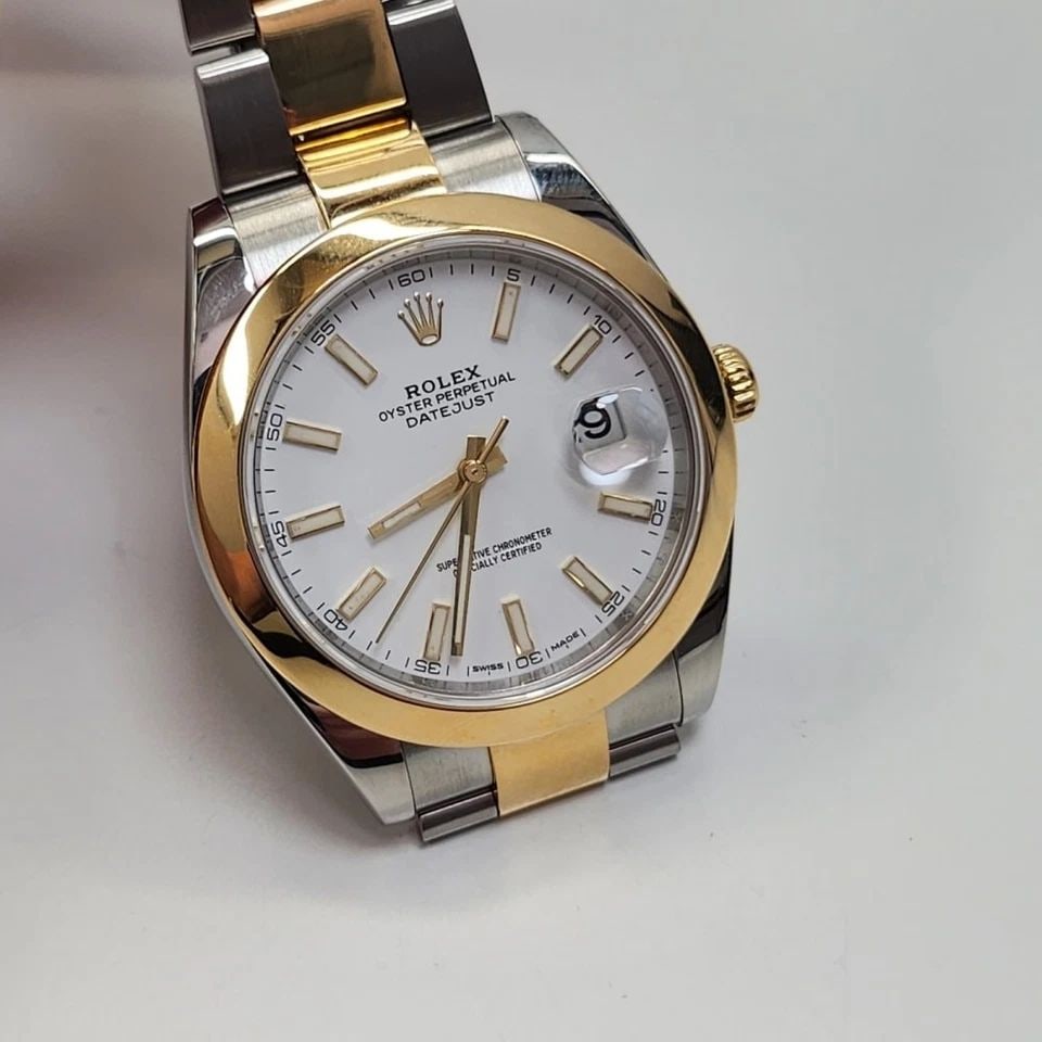 ROLEX DATEJUST 41 MM STEEL 18K YELLOW GOLD OYSTER WHITE AUTOMATIC WATCH 126303: ROLEX DATEJUST 41 MM STEEL 18K YELLOW GOLD OYSTER WHITE AUTOMATIC WATCH Manufacturer Rolex Category Datejust Reference Number 126303 Band Steel ,Yellow Gold Band Color Yellow Gold & Stainless Steel Ba