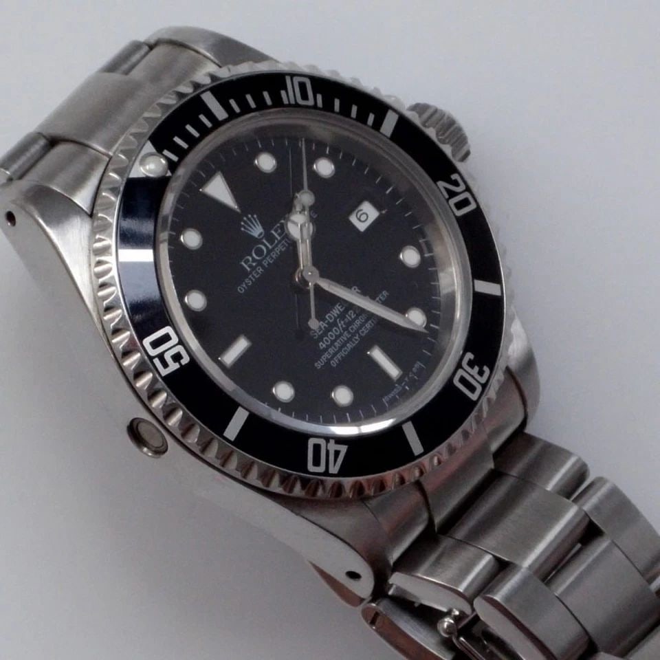 ROLEX SEA DWELLER 4000FT 40 MM STEEL BLACK AUTOMATIC WATCH 16600 W SERIES 1995 (1 of 2)