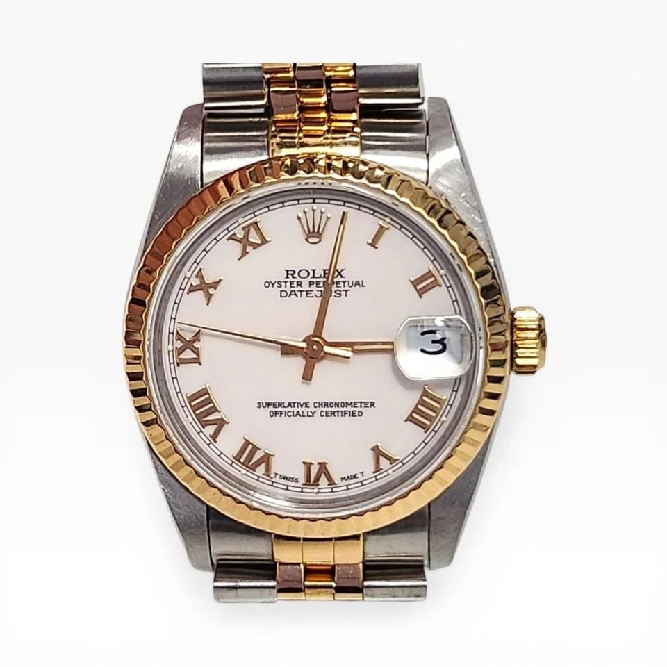 ROLEX DATEJUST 31 MM JUBILEE STEEL 18K YELLOW GOLD WATCH 68273 N SERIES 1991: ROLEX DATEJUST 31 MM JUBILEE STEEL 18K YELLOW GOLD WATCH 68273 N SERIES 1991 Manufacturer Rolex Category Mid size Datejust Reference Number 68273 Band Steel ,Yellow Gold Band Color Yellow Gold & Stain