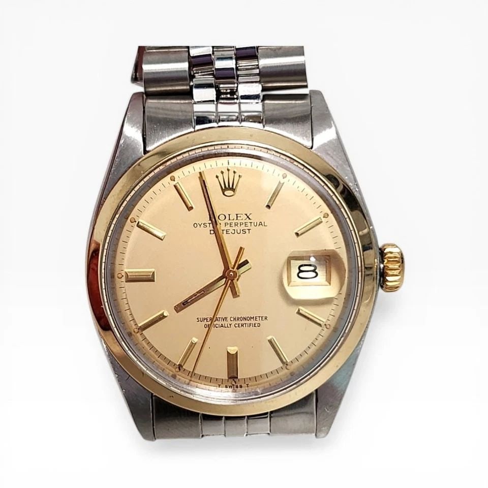 ROLEX DATEJUST 36 MM TWO TONE JUBILEE CHAMPAGNE AUTOMATIC WATCH 1600 CIRCA 1972: ROLEX DATEJUST 36 MM TWO TONE JUBILEE CHAMPAGNE AUTOMATIC WATCH Manufacturer Rolex Category Mens Datejust 36mm Subcategory Plastic Crystal Non Quick Reference Number 1600 Band Stainless Steel Band Col
