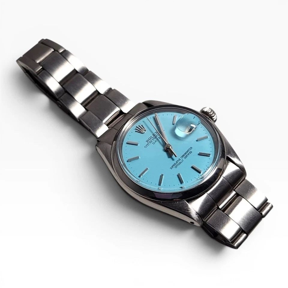 ROLEX DATE 34 MM BLUE TURQUOISE STEEL OYSTER AUTOMATIC WATCH 1501 CIRCA 1969: ROLEX DATE 34 MM BLUE TURQUOISE STEEL OYSTER AUTOMATIC WATCH 1501 CIRCA 1969 Manufacturer Rolex Category Mens Date 34mm Reference Number 1501 Band Stainless Steel Band Color Steel Band Type Oyster Bez