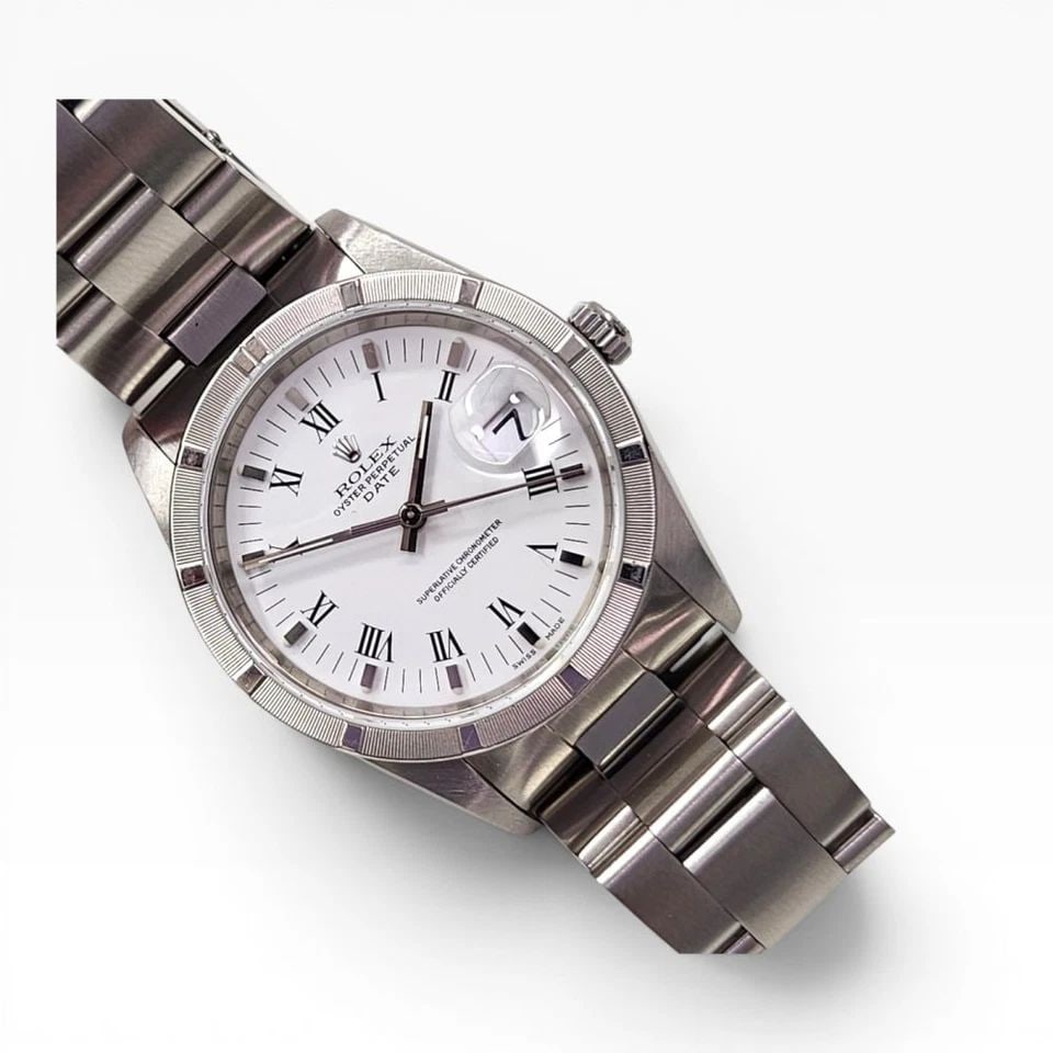 ROLEX DATE 34 MM STEEL WHITE ROMAN OYSTER AUTOMATIC WATCH 15200 Z SERIES 2006: ROLEX DATE 34 MM STEEL WHITE ROMAN OYSTER AUTOMATIC WATCH 15200 Z SERIES 2006 Manufacturer Rolex Category Mens Date 34mm Subcategory Sapphire Crystal Quick Set Reference Number 15200 Band Stainless St