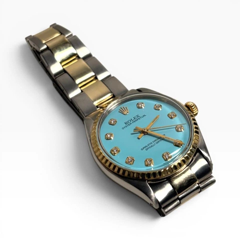 ROLEX OYSTER PERPETUAL 34MM TWO TONE BLUE TURQUOISE DIAMOND WATCH 5500 YEAR 1969: ROLEX OYSTER PERPETUAL 34MM TWO TONE BLUE TURQUOISE DIAMOND WATCH 5500 YEAR 1969 Manufacturer Rolex Category Mens No Date 34mm Reference Number 5500 Band Steel ,Yellow Gold Band Color Yellow Gold & St