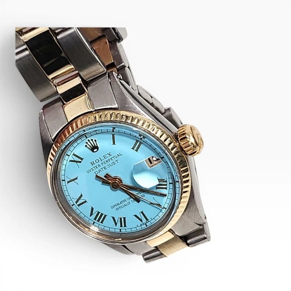 W/PAPERS 1979 ROLEX LADIES DATE 26 MM TWO TONE WHITE ROMAN AUTOMATIC WATCH 6916: W/PAPERS 1979 ROLEX LADIES DATE 26 MM TWO TONE WHITE ROMAN AUTOMATIC WATCH Manufacturer Rolex Category Oyster Perpetual Ladies Date Reference Number 6916 Band Stainless Steel Band Color Steel Band Typ