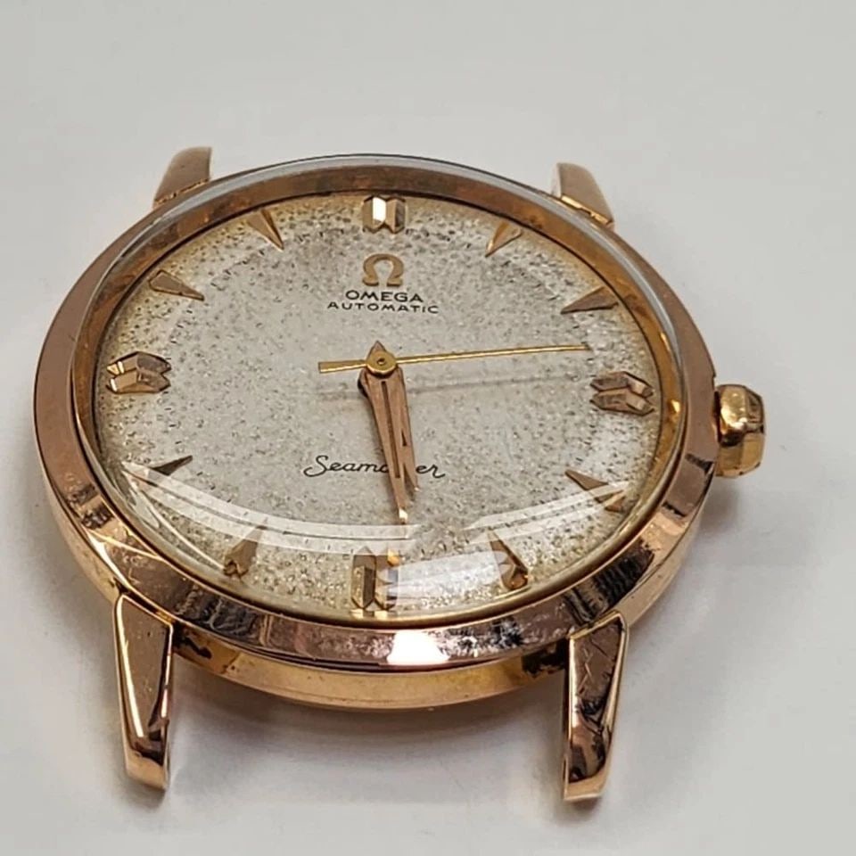 VINTAGE OMEGA 34 MM 18K YELLOW GOLD AUTOMATIC HEAD ONLY WATCH 166001 60'S: VINTAGE OMEGA 34 MM 18K YELLOW GOLD AUTOMATIC HEAD ONLY WATCH Manufacturer Omega Category Seamaster Reference Number 166001 Bezel Smooth Bezel Bezel color Yellow gold Box No Case Lock Screw Down Back 