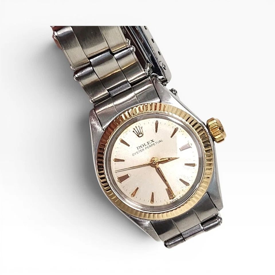 ROLEX OYSTER PERPETUAL LADIES CANDY PINK STEEL AUTOMATIC WATCH 6618 CIRCA 1967: ROLEX OYSTER PERPETUAL LADIES CANDY PINK STEEL AUTOMATIC WATCH 6618 CIRCA 1967 Manufacturer Rolex Category Oyster Perpetual Ladies No Date Reference Number 6618 Band Stainless Steel Band Color Steel B