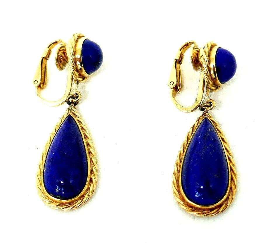 VINTAGE 14K YELLOW GOLD LAPIS DROP EARRINGS: VINTAGE 14K YELLOW GOLD LAPIS DROP EARRINGS Vintage braided 14k yellow gold lapis lazuli drop clip-on earrings Stamped a hallmark for 14k gold Measurements: 1/2" W x 1 3/4" L Total weight is 12.0 gram