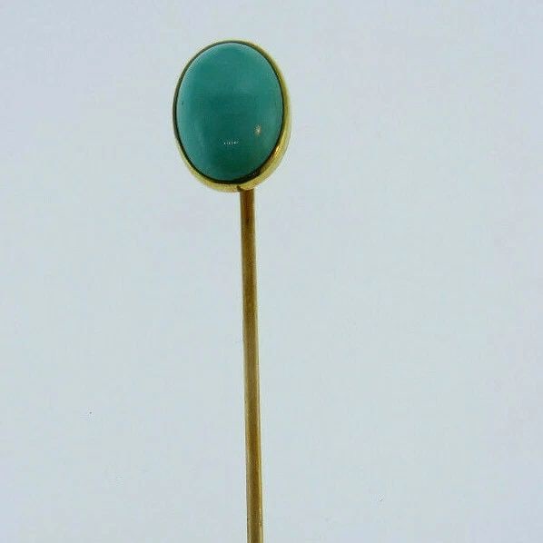 VICTORIAN 14K YELLOW GOLD TURQUOISE PIN: VICTORIAN 14K YELLOW GOLD TURQUOISE PIN Victorian 14k yellow gold turquoise pin Stamped with a hallmark for 14k gold Measurements: length is 2 1/2", the head is 3/8" W x 1/2" L Weight is 2.4 grams In 