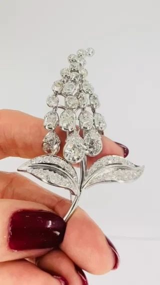 ANTIQUE RENE BOIVIN PLATINUM DIAMOND BROOCH CIRCA 1880S: ANTIQUE RENE BOIVIN PLATINUM DIAMOND BROOCH CIRCA 1880S VK NEOOO Rene Boivin Platinum Diamond Lily Brooch This antique Rene Boivin platinum and diamond lily-of-the-valley brooch, dating to the 1880s, 