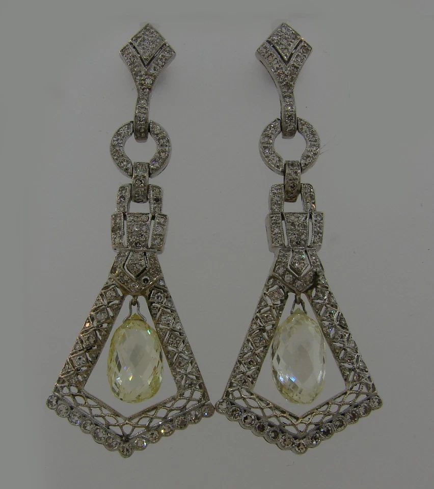 DIAMOND BRIOLETTE WHITE GOLD DANGLE EARRINGS 1930S FEMININE: DIAMOND BRIOLETTE WHITE GOLD DANGLE EARRINGS 1930S FEMININE Diamond Briolette14 karat White Gold Dangle Earrings A pair of fabulous dangle earrings! Feminine and dazzling, they are a great addition to