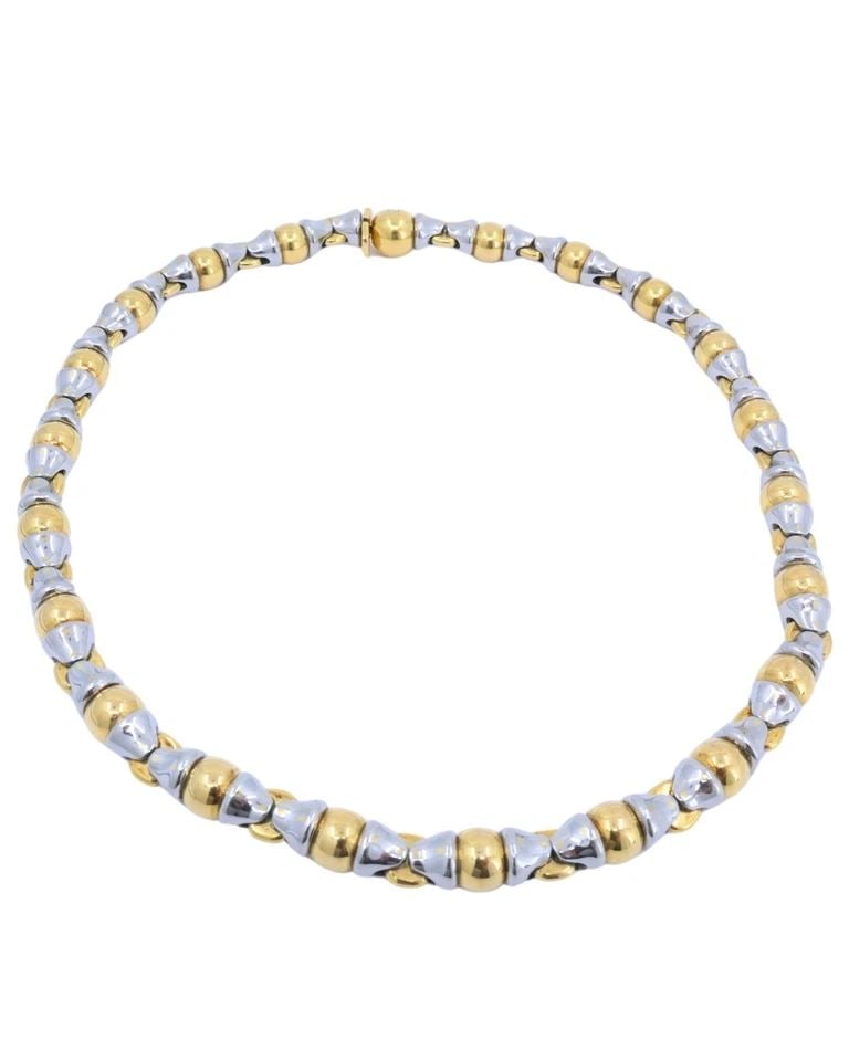 BVLGARI VINTAGE BULGARI 18K GOLD STAINLESS STEEL COLLAR NECKLACE: BVLGARI VINTAGE BULGARI 18K GOLD STAINLESS STEEL COLLAR NECKLACE NS JUUUT A vintage Bulgari collar necklace made of 18k gold and stainless steel. The necklace features a repeating link design that alt