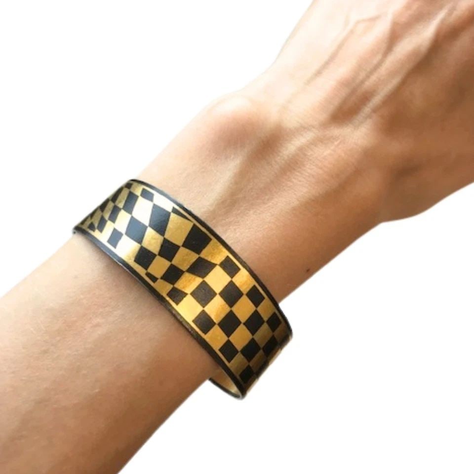 VINTAGE TIFFANY & CO. ANGELA CUMMINGS DAMASCENE GOLD STEEL LACQUER CUFF BANGLE (1 of 2)