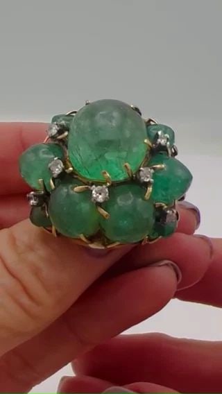 VINTAGE RING 14K GOLD EMERALD COCKTAIL ESTATE JEWELRY: 14 karat Yellow Gold Emerald Diamond Cocktail Ring A whimsical vintage ring made of 14 karat yellow gold featuring cabochon emerald. The cabochon emeralds are staged as a free form cluster, with a big