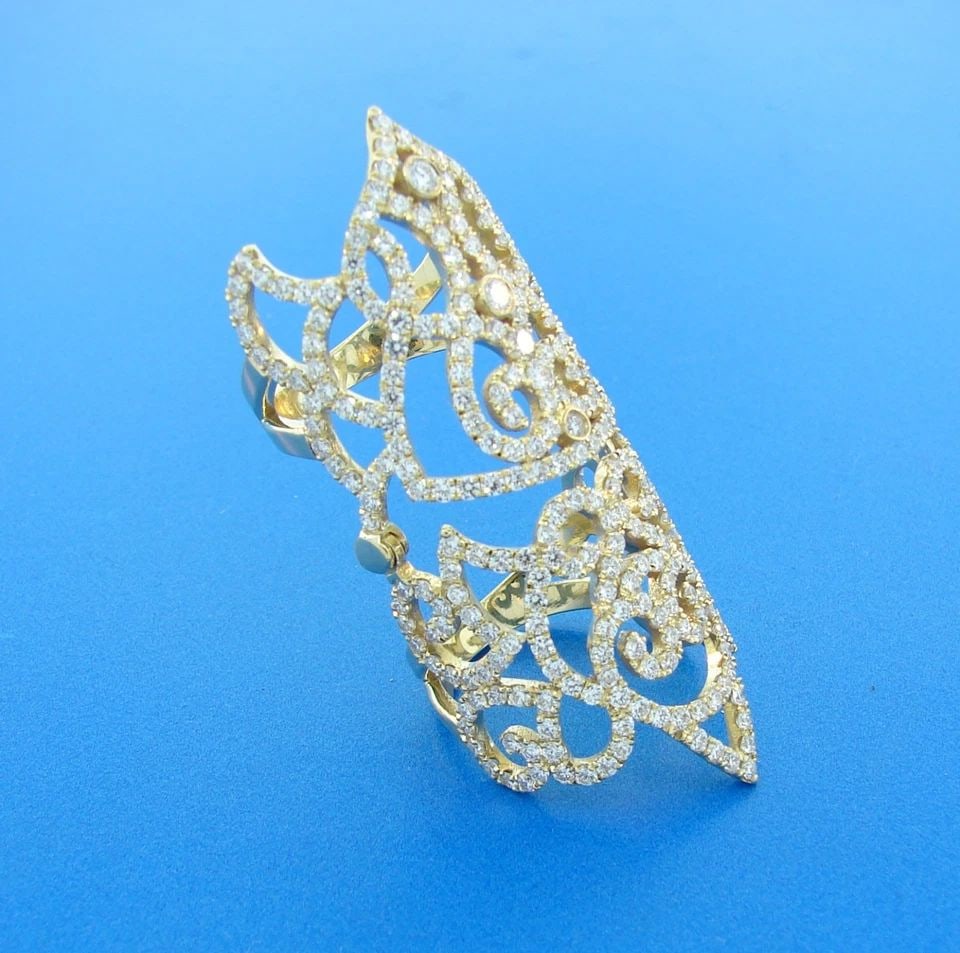 TRENDY DIAMOND YELLOW GOLD FULL-FINGER RING WIDE BAND CHIC: TRENDY DIAMOND YELLOW GOLD FULL-FINGER RING WIDE BAND CHIC Diamond Yellow Gold Full-Finger Ring Wonderful ring that is a great addition to your collection. Weight is 14.2 grams. Made of 18 karat (stam