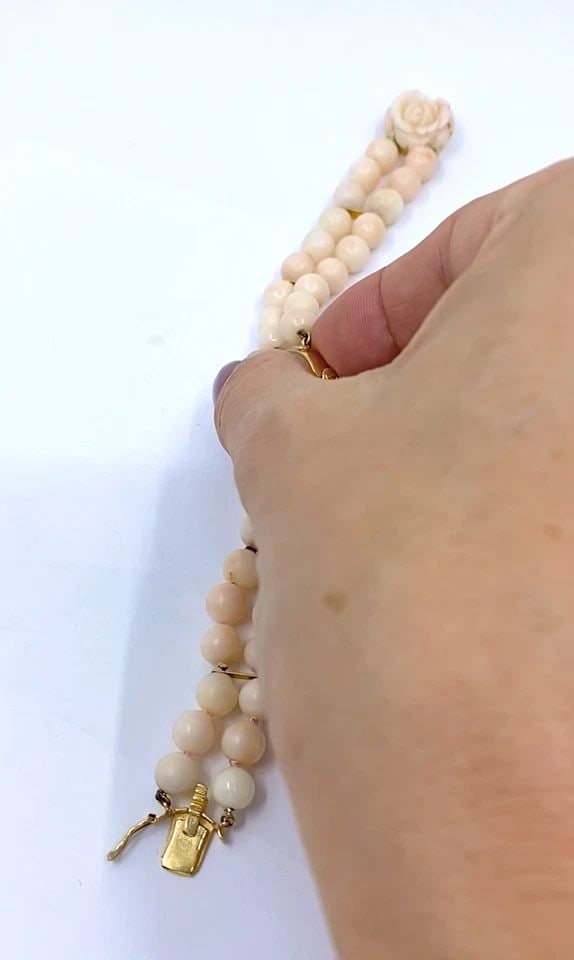 BAUME & MERCIER 14K ANGEL SKIN CORAL DOUBLE STRAND BRACELET WATCH, 1960S: BAUME & MERCIER 14K ANGEL SKIN CORAL DOUBLE STRAND BRACELET WATCH, 1960S ES JAOO ITEM DETAILS Baume & Mercier 14k Angel Skin Coral Double Strand Bracelet Watch, 1960s A feminine vintage Baume & Mercie
