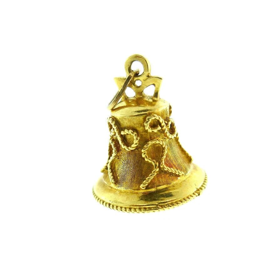 VINTAGE 18K YELLOW GOLD JADE BELL CHARM: VINTAGE 18K YELLOW GOLD JADE BELL CHARM Features hammered gold and filigree elements. Can be wearing as a pendant. Stamped with a hallmark for 18k gold Measurements: 1 1/8" H x 3/4" W Weight is 7.2 gr
