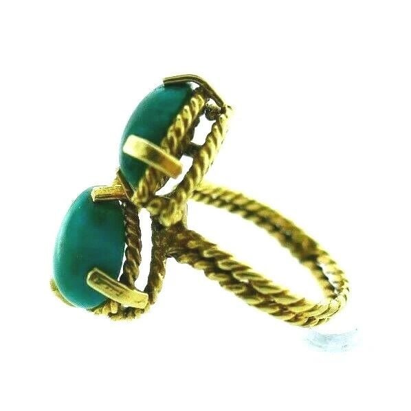 VINTAGE 14K YELLOW GOLD & TURQUOISE BYPASS RING: VINTAGE 14K YELLOW GOLD & TURQUOISE BYPASS RING Vintage 14k Yellow Gold & Turquoise Bypass Ring This is a must for a collector. The weight is 3.8 grams. The height is 3/4 of an inch. The width of band