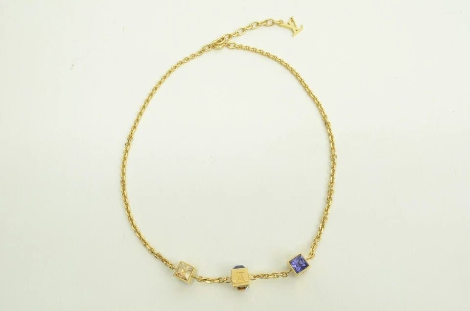 AUTHENTIC LOUIS VUITTON WHITE PURPLE GEMSTONE CUBE CHARM LOGO MONOGRAM NECKLACE: AUTHENTIC LOUIS VUITTON WHITE PURPLE GEMSTONE CUBE CHARM LOGO MONOGRAM NECKLACE Authentic Louis Vuitton White Purple Gemstone Cube Charm Logo Monogram Necklace AUTHENTIC LOUIS VUITTON WHITE PURPLE GEM