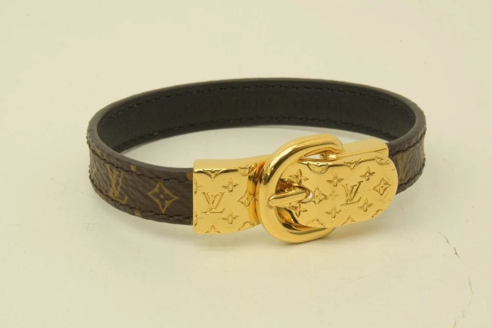 AUTHENTIC LOUIS VUITTON MONOGRAM SLIP ON BRACELET SIGNATURE LOGO MAGNET JEWELRY: AUTHENTIC LOUIS VUITTON MONOGRAM SLIP ON BRACELET SIGNATURE LOGO MAGNET JEWELRY Authentic Louis Vuitton Monogram Slip On Bracelet Signature Logo Magnet Jewelry AUTHENTIC LOUIS VUITTON MONOGRAM SLIP ON