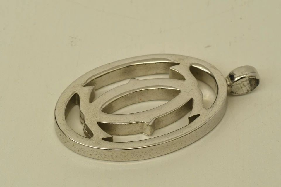 AUTHENTIC CARTIER DECOR LOGO CLASSIC SILVER CHARM SWISS MADE SIGNATURE ACCESSORY (1 of 2)