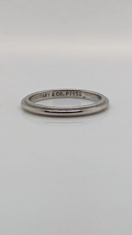 TIFFANY & CO. TOGETHER PLATINUM 2MM MILGRAIN WEDDING BAND RING SIZE 5.5: Tiffany & Co. Tiffany Together Platinum Milgrain Wedding Band Ring Ring Size - 5.5 Width - 2mm Weight - 3.3 Grams Professionally polished & Looks like New Pouch Not Included