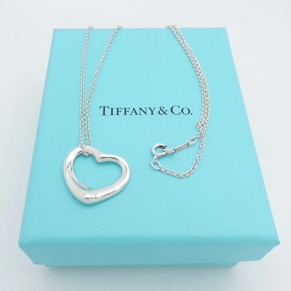 TIFFANY & CO. PERETTI STERLING SILVER OPEN HEART 22MM PENDANT NECKLACE 16" BOX: TIFFANY & CO. PERETTI STERLING SILVER OPEN HEART 22MM PENDANT NECKLACE 16" BOX Tiffany & Co. Elsa Peretti Sterling Silver Open Heart Pendant Chain Necklace Length - 16" Long Chain Width - 1.5mm Thick 