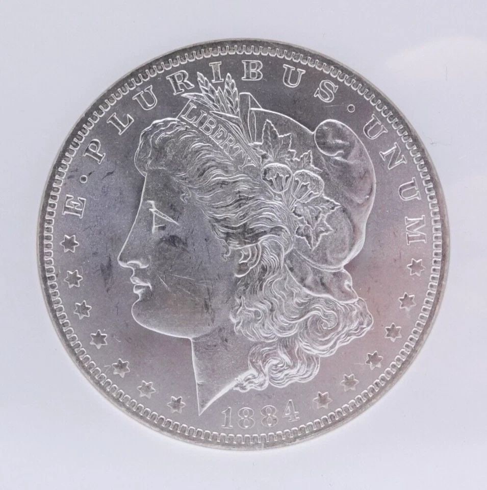 1884-O MORGAN SILVER DOLLAR $1 COIN - NGC MS 64: 1884 - New Orleans Morgan Silver Dollar .900 Fine Silver $1 Coin NGC Certified - MS 64 NGC Cert #