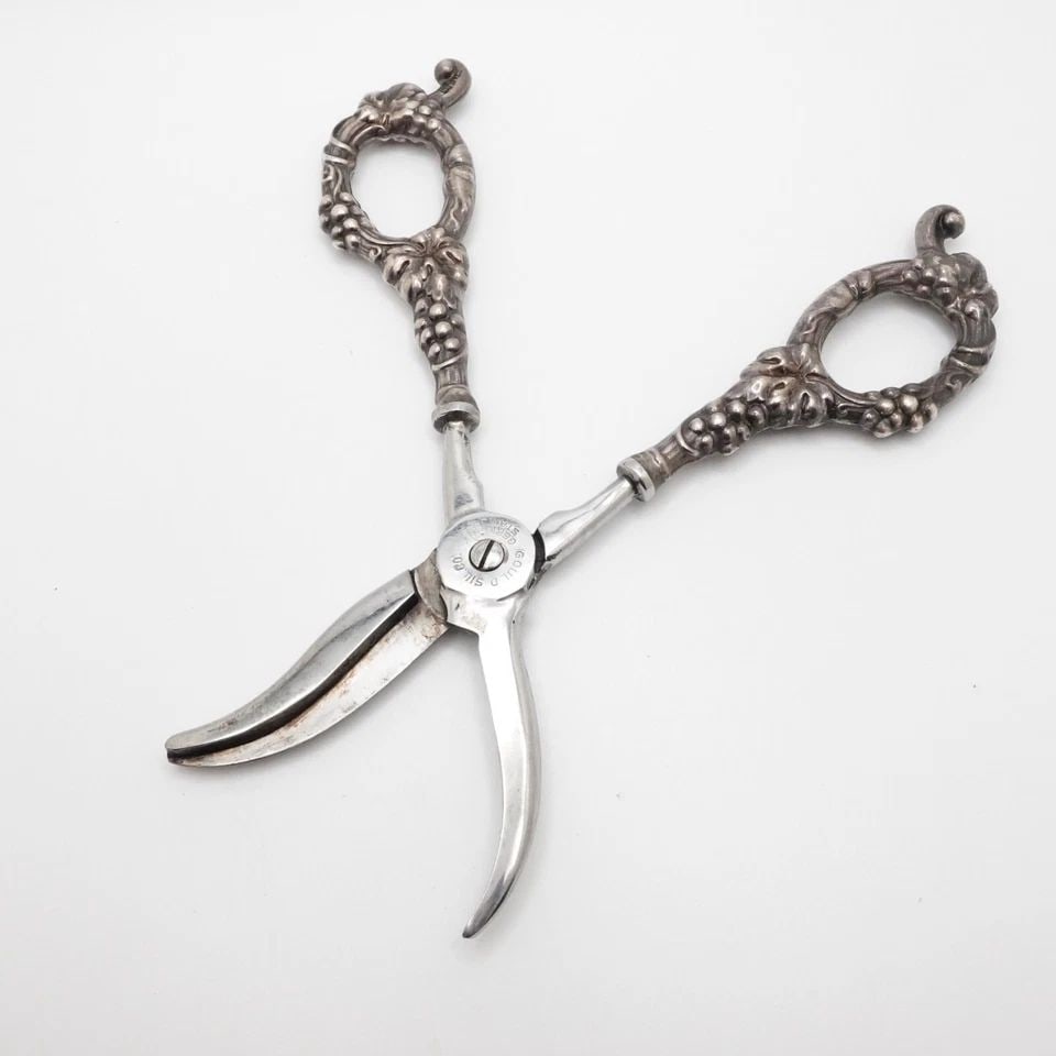 GOULD SILVER CO. GERMANY STERLING SILVER HANDLE GRAPE VINE SEAR SCISSORS - 7": GOULD SILVER CO. GERMANY STERLING SILVER HANDLE GRAPE VINE SEAR SCISSORS - 7" Gould Germany Sterling Silver Grape Handle Sear Scissors Length - 7" Total Weight - 80.5 Grams