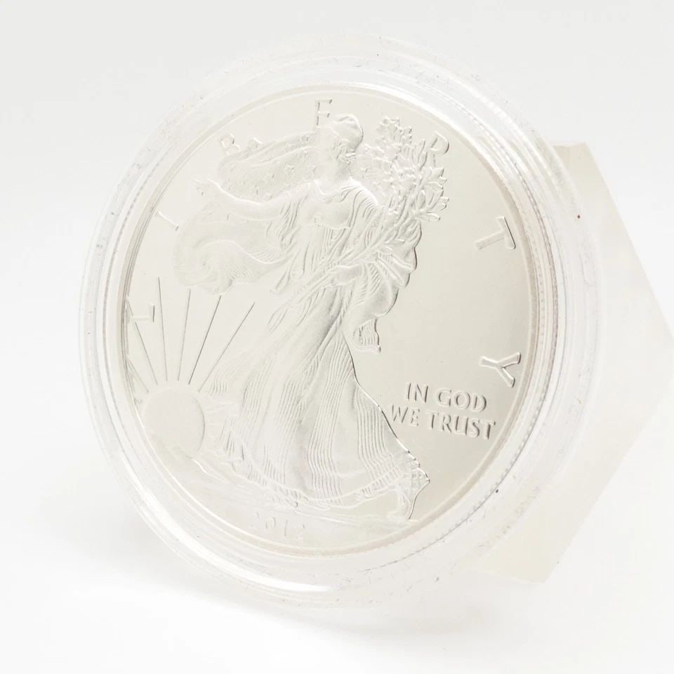 2012 W AMERICAN EAGLE UNCIRCULATED SILVER $1 DOLLAR COIN - CAPSULATED: 2012 W AMERICAN EAGLE UNCIRCULATED SILVER $1 DOLLAR COIN - CAPSULATED 2012 W American Eagle Uncirculated Silver $1 Dollar Excellent & Capsulated Coins have not been opened or touched from their capsul