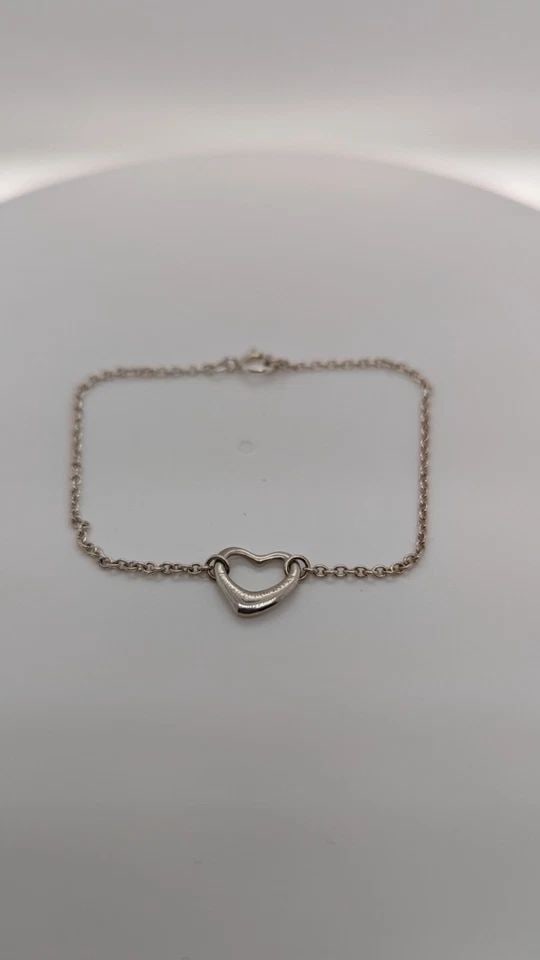 TIFFANY & CO. ELSA PERETTI STERLING SILVER OPEN HEART DAINTY BRACELET - 5.75": Tiffany & Co. Elsa Peretti Sterling Silver Open Heart Dainty Bracelet Length - 5.75" Long Total Weight - 1.2 Grams