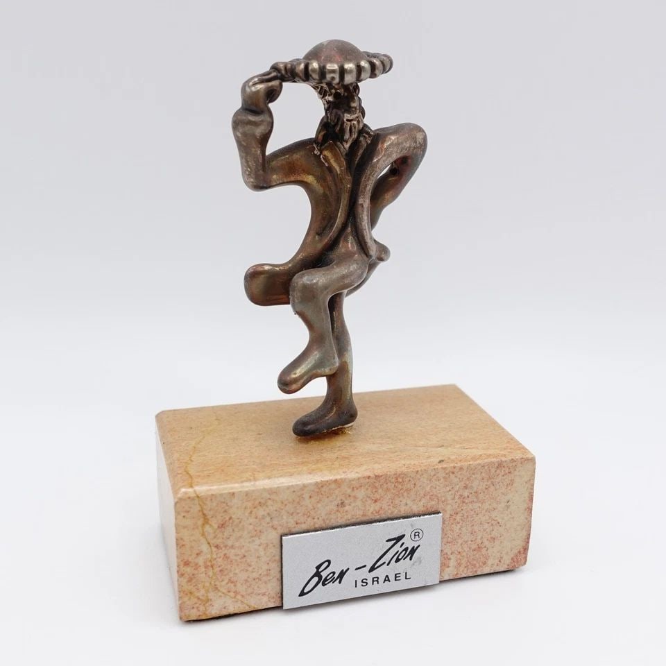 BEN ZION ISRAEL STERLING SILVER MAN DANCING FIGURINE W. MARBLE BASE - 3": BEN ZION ISRAEL STERLING SILVER MAN DANCING FIGURINE W. MARBLE BASE - 3" Ben Zion Israel Sterling Silver Man Dancing Figurine w. Marble Base Height - 3" Base Length - 2" Base Width - 1.1" Total Weight