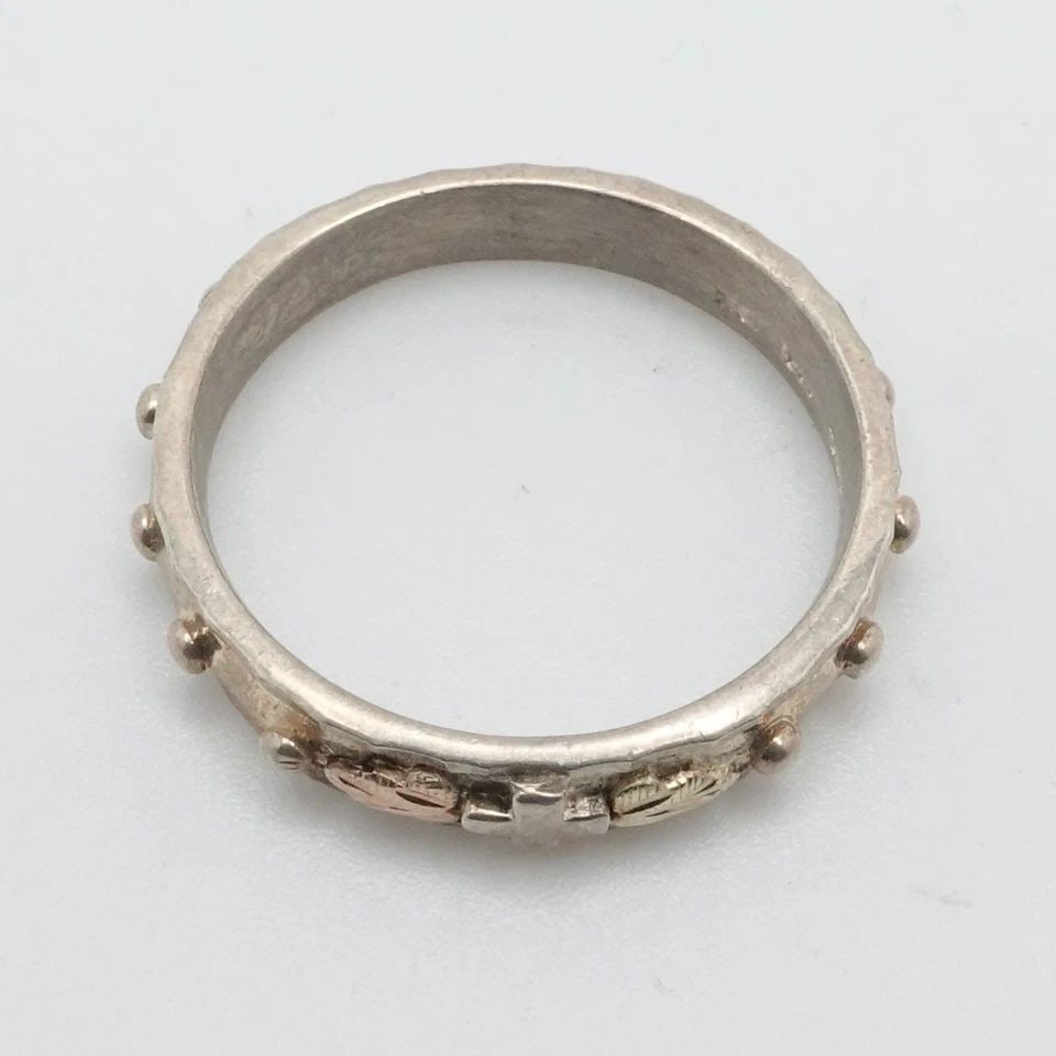 RGC STERLING SILVER TWO TONE LEAF CROSS 5MM BAND RING SIZE 100: RGC STERLING SILVER TWO TONE LEAF CROSS 5MM BAND RING SIZE 100 Signed RGC Sterling Silver Two Tone Gold Leaf Cross 5mm Band Ring Size - 10 Total Weight - 4.7 Grams Hallmark - RGC 925 12K