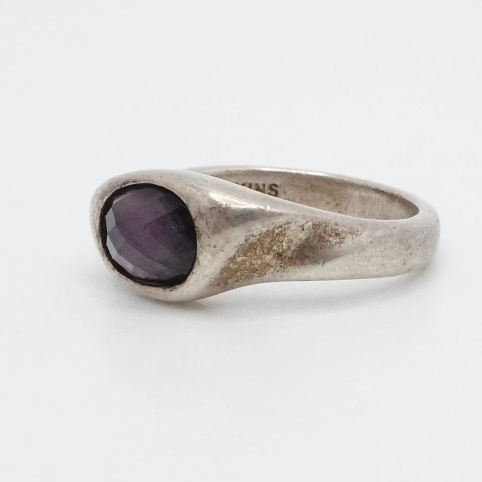 MICHAEL DAWKINS STERLING SILVER FACETED AMETHYST TWIST RING - SIZE 7.25: MICHAEL DAWKINS STERLING SILVER FACETED AMETHYST TWIST RING - SIZE 7.25 Michael Dawkins Sterling Silver Faceted Amethyst Twist Ring Size - 7.25 Band Width - 3mm Stone Size - 5mm x 7mm Total Weight - 5