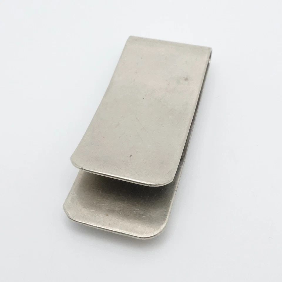 SILVER ZUNI SUN MULTI GEMSTONE INLAY MONEY CLIP: SILVER ZUNI SUN MULTI GEMSTONE INLAY MONEY CLIP Silver Zuni Sun Multi Gemstone Inlay Money Clip Length - 1.75" Width - 0.75" Gap Width - 3mm Total Weight - 12.5 Grams