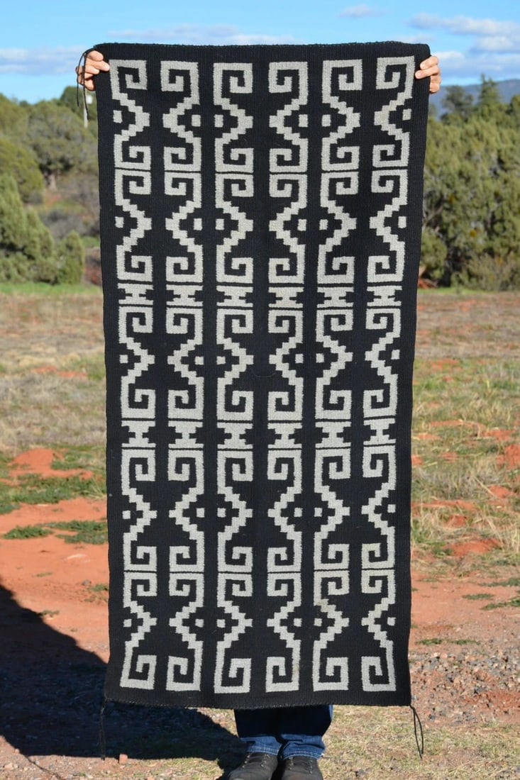 VINTAGE NAVAJO RUG - UNIQUE GREY ON BLACK DESIGN - BEAUTIFULLY WOVEN - 59" X 28": VINTAGE NAVAJO RUG - UNIQUE GREY ON BLACK DESIGN - BEAUTIFULLY WOVEN - 59" X 28" This beautifully woven Navajo rug shows a unique grey on black design. The rug measures 59" long by 28" wide. This rug 