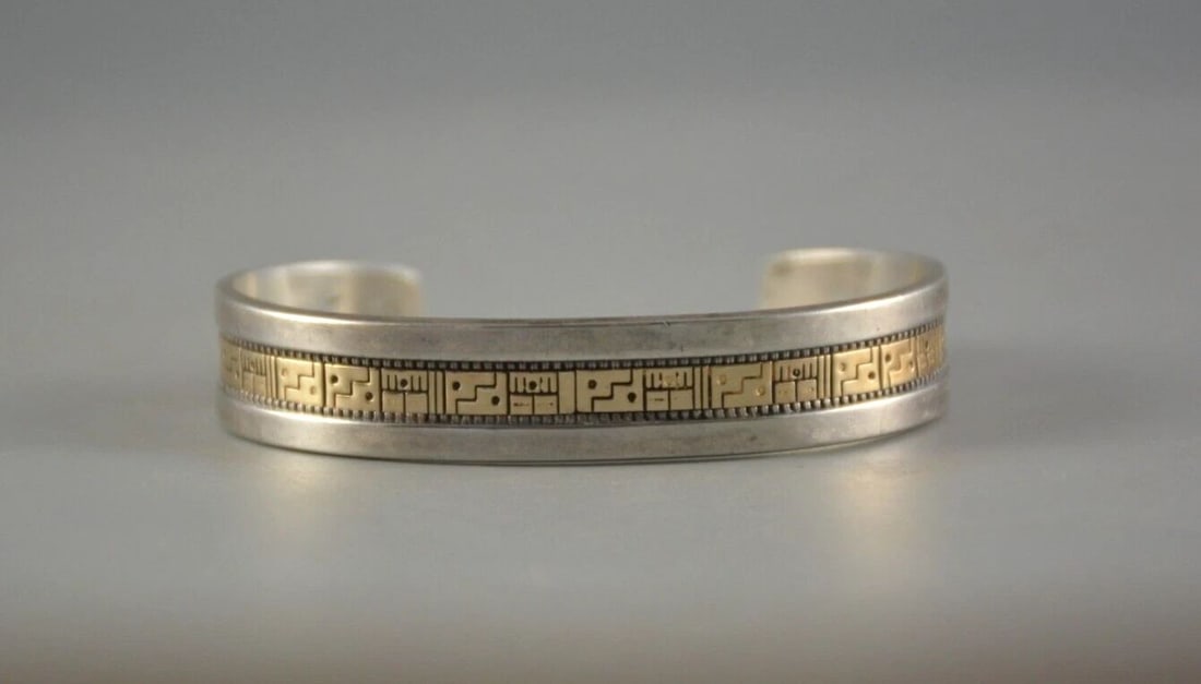 RODERICK TENORIO - SANTO DOMINGO KEWA SOLID 14 KARAT GOLD ON STERLING SILVER: RODERICK TENORIO - SANTO DOMINGO KEWA SOLID 14 KARAT GOLD ON STERLING SILVER Item Description: This vintage Solid 14 karat gold on sterling silver bracelet has been beautifully crafted by well known K